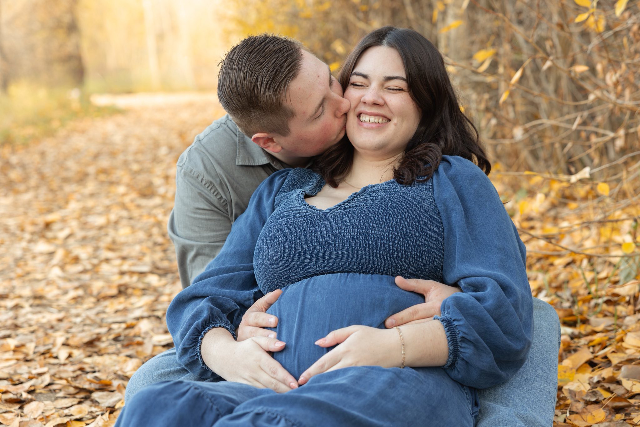 The couple embracing, Jackson kissing Amellia's cheek